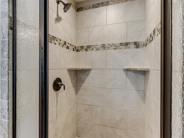 room details featuring a shower stall