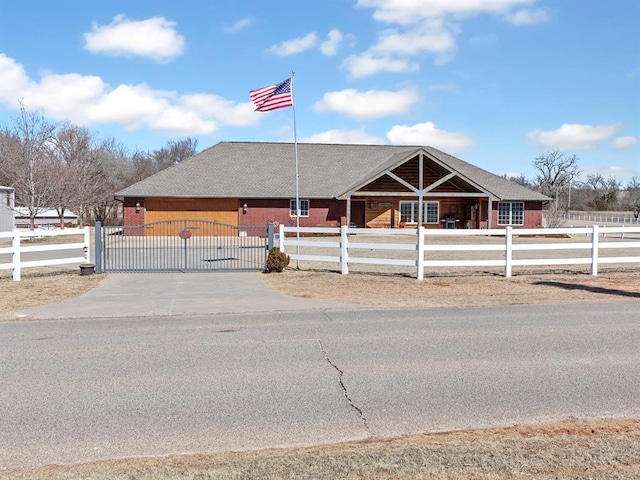 view of front of property featuring a gate and a fenced front yard