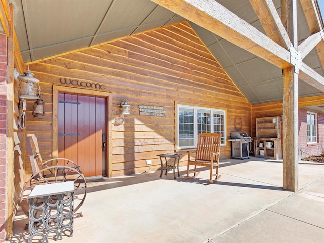 view of patio with a grill