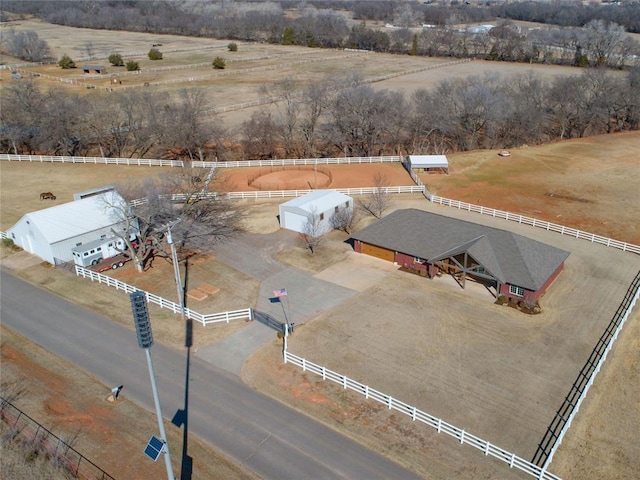 birds eye view of property featuring a rural view