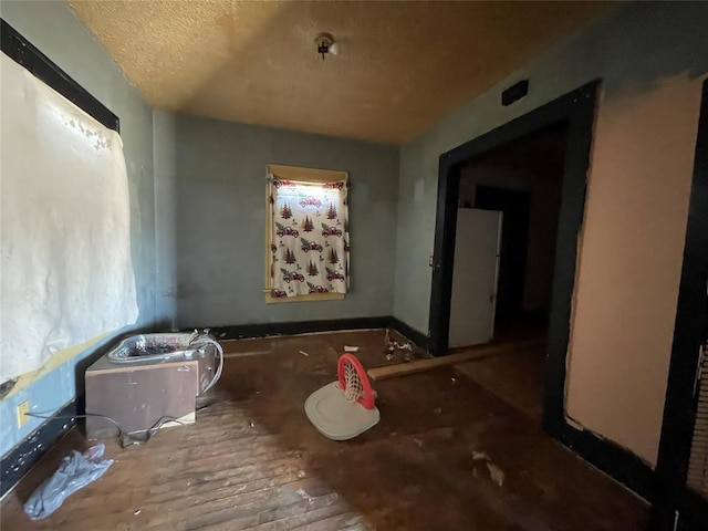 bathroom with a textured ceiling