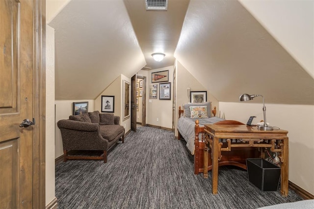 bedroom with visible vents, dark carpet, baseboards, and vaulted ceiling