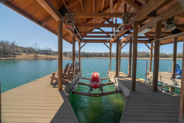 view of dock with a water view and boat lift