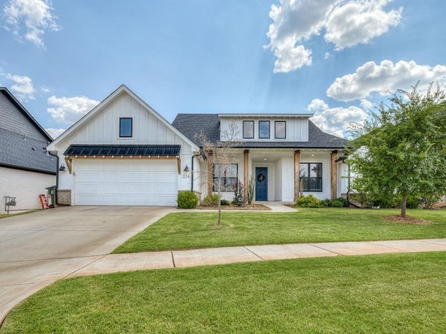 114 Alamosa Rd, Norman, OK 73069 - modern farmhouse style home with board and batten siding, a garage, concrete driveway, a front lawn, and a shingled roof