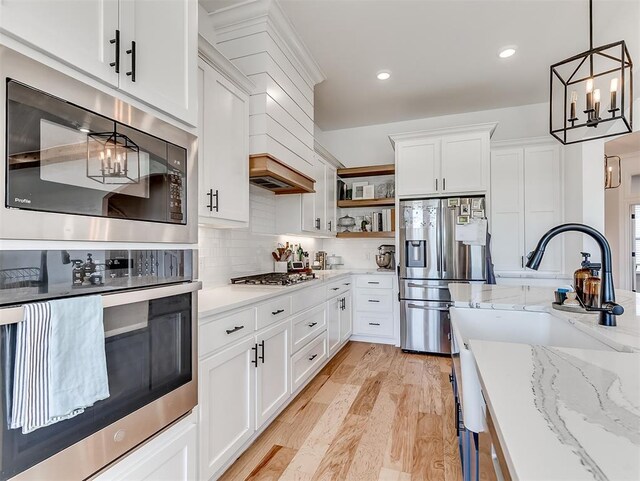 114 Alamosa Rd, Norman, OK 73069 - kitchen featuring stainless steel appliances, a chandelier, open shelves, white cabinets, and recessed lighting