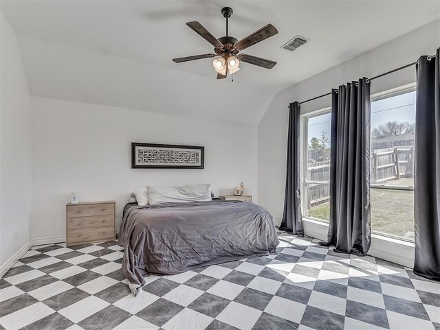 114 Alamosa Rd, Norman, OK 73069 - bedroom with vaulted ceiling, multiple windows, and ceiling fan