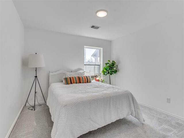 114 Alamosa Rd, Norman, OK 73069 - bedroom with carpet floors and baseboards