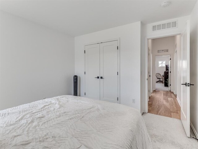 114 Alamosa Rd, Norman, OK 73069 - bedroom with a closet and baseboards