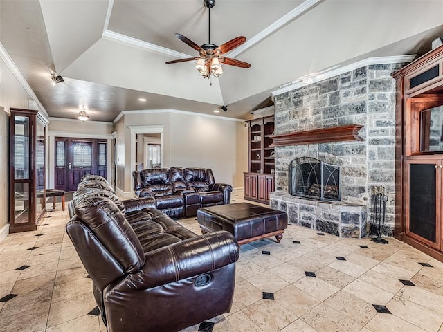 tiled living area featuring built in features, baseboards, ceiling fan, a stone fireplace, and ornamental molding