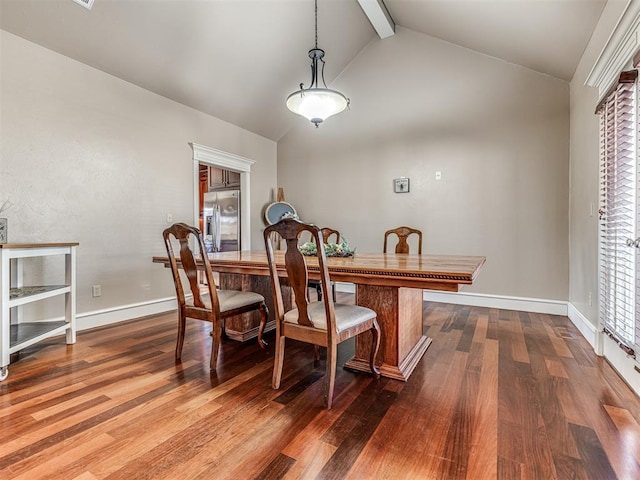 dining room featuring baseboards, beam ceiling, high vaulted ceiling, and wood finished floors