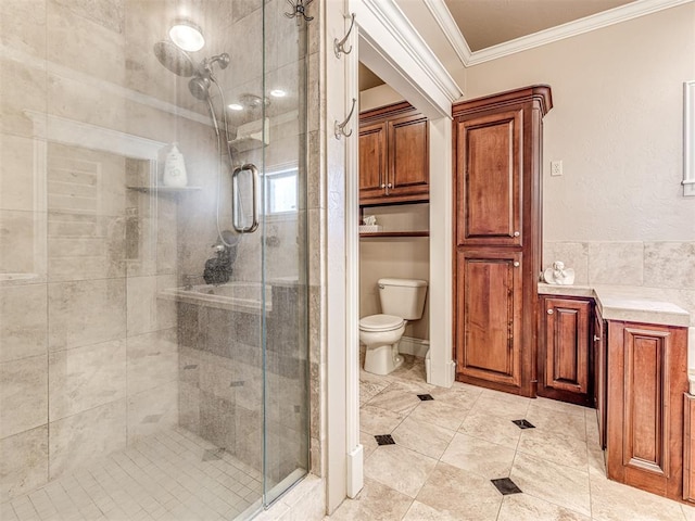 full bath featuring toilet, a shower stall, and crown molding