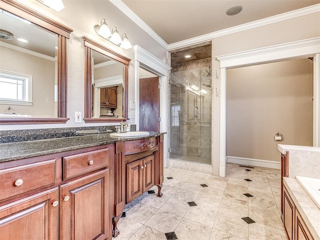 full bathroom featuring a shower stall, vanity, crown molding, and baseboards