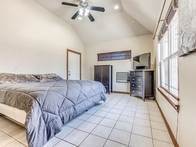 bedroom featuring vaulted ceiling, light tile patterned flooring, baseboards, and ceiling fan