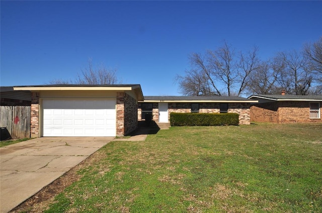 single story home featuring brick siding, concrete driveway, a front lawn, and a garage