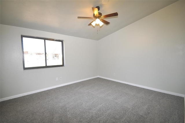 2121 Memphis Dr, Norman, OK 73071 - unfurnished room with carpet flooring, ceiling fan, baseboards, and vaulted ceiling