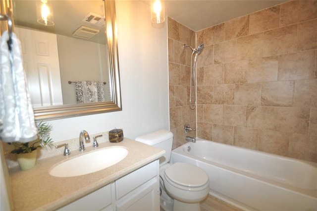 2121 Memphis Dr, Norman, OK 73071 - full bath featuring vanity, toilet, visible vents, and shower / washtub combination