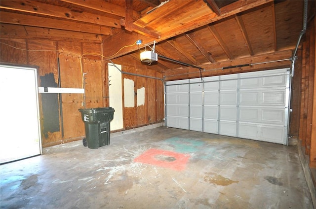 2121 Memphis Dr, Norman, OK 73071 - garage featuring a garage door opener