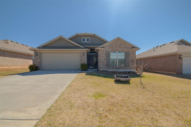 view of front of house featuring brick siding, a front yard, concrete driveway, and an attached garage