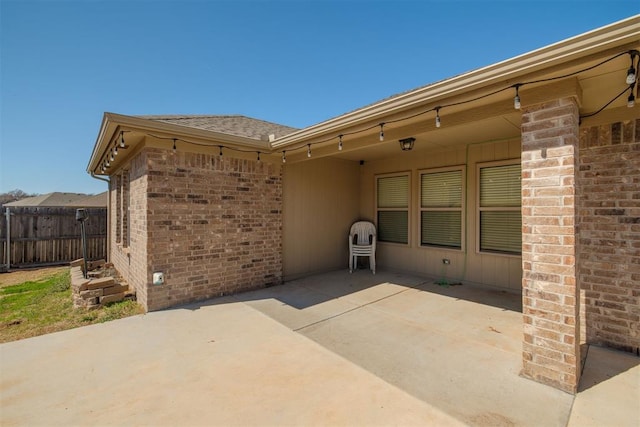 view of patio with fence