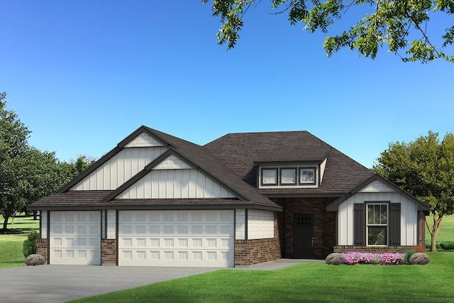 view of front of home with a front yard, brick siding, a garage, and driveway