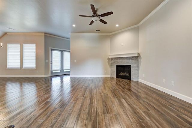 unfurnished living room featuring baseboards, a ceiling fan, and wood finished floors