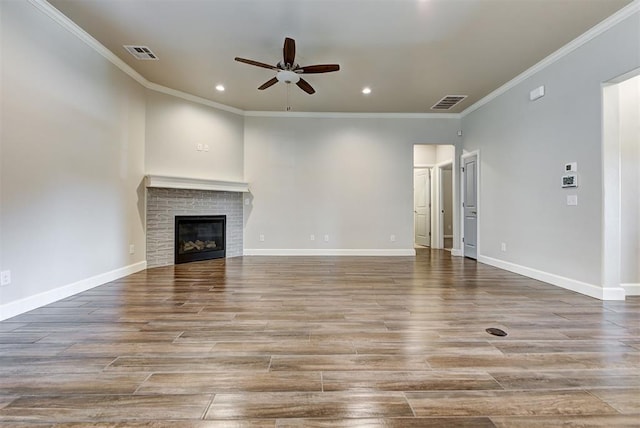 unfurnished living room with visible vents, baseboards, a ceiling fan, and wood finished floors