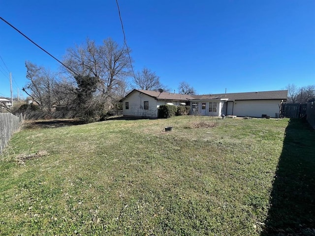 view of yard with fence