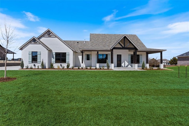 modern farmhouse with covered porch and a front lawn