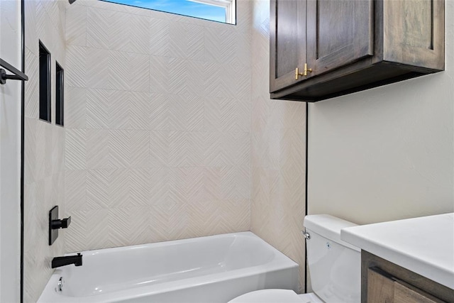 bathroom featuring shower / bathing tub combination and toilet