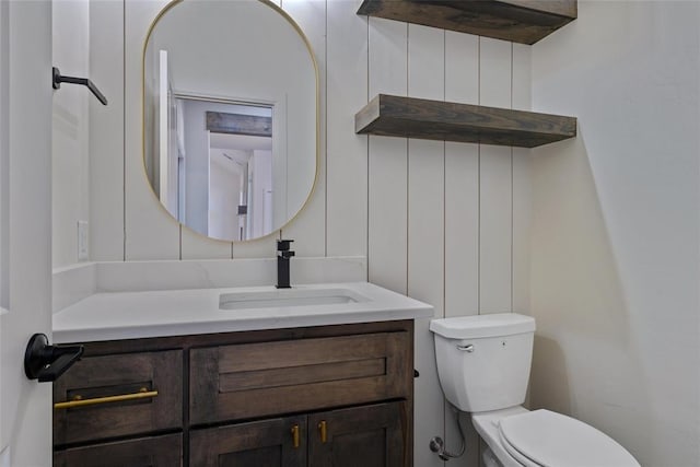 half bath with toilet and vanity