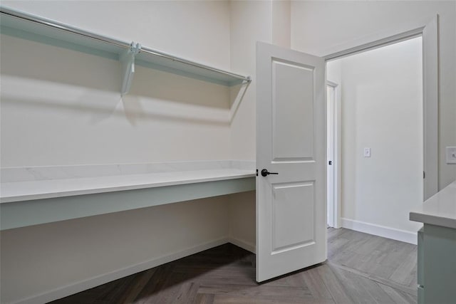 interior space featuring baseboards