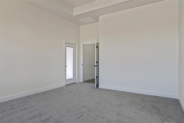 carpeted spare room with baseboards