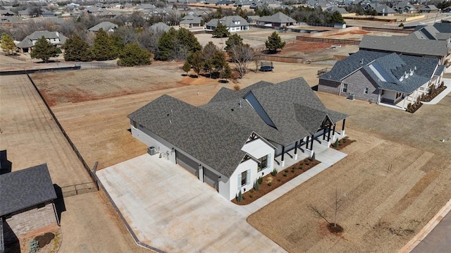 drone / aerial view featuring a residential view