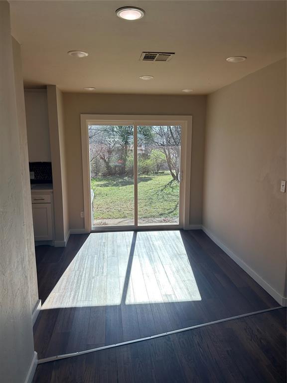 entryway with visible vents, recessed lighting, baseboards, and dark wood-style flooring