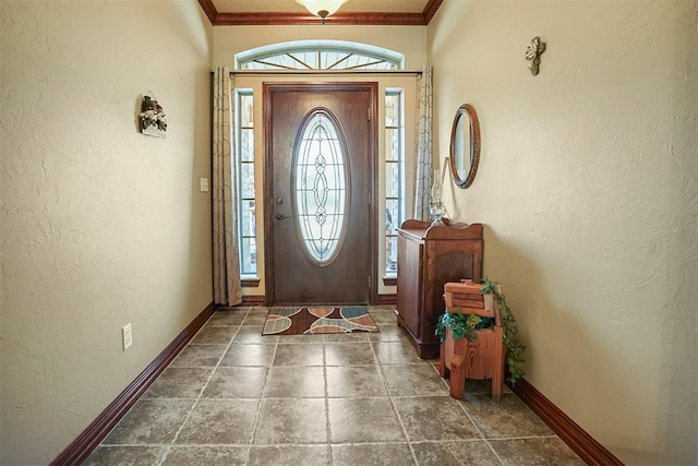 12611 N County Road 3232nd Rd, Paoli, OK 73074 - foyer entrance with crown molding, a textured wall, and baseboards