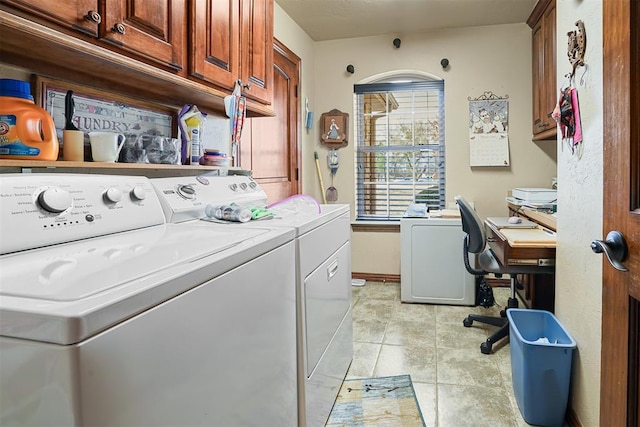 12611 N County Road 3232nd Rd, Paoli, OK 73074 - laundry area featuring washing machine and clothes dryer, light tile patterned floors, cabinet space, and baseboards