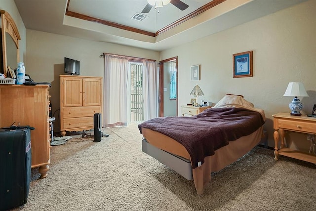 12611 N County Road 3232nd Rd, Paoli, OK 73074 - carpeted bedroom with a tray ceiling, access to outside, crown molding, and visible vents