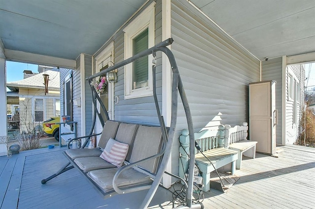 deck featuring covered porch