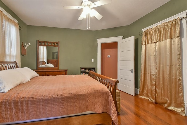 bedroom featuring ceiling fan and wood finished floors