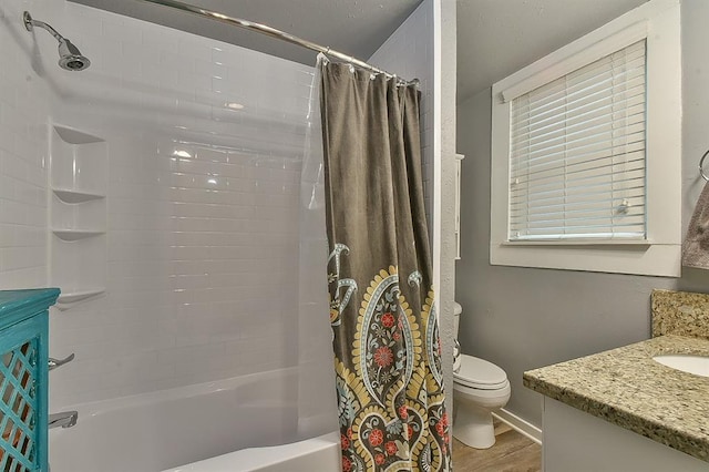 full bath with vanity, toilet, shower / tub combo, and wood finished floors