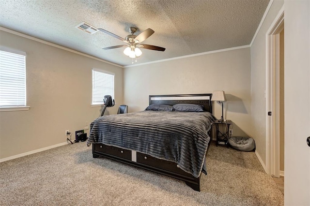 carpeted bedroom with crown molding, visible vents, and a textured ceiling