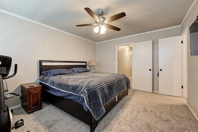 bedroom featuring light colored carpet, crown molding, and a textured ceiling