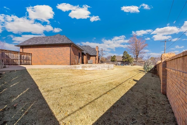 view of yard featuring a fenced backyard