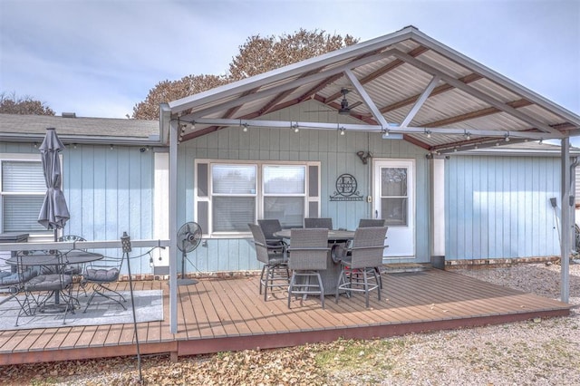 deck with outdoor dining space