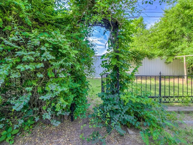 view of yard with fence