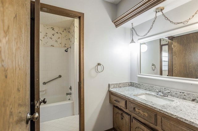 bathroom with vanity and shower / bathing tub combination