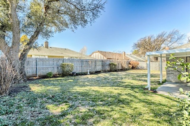 view of yard featuring a fenced backyard