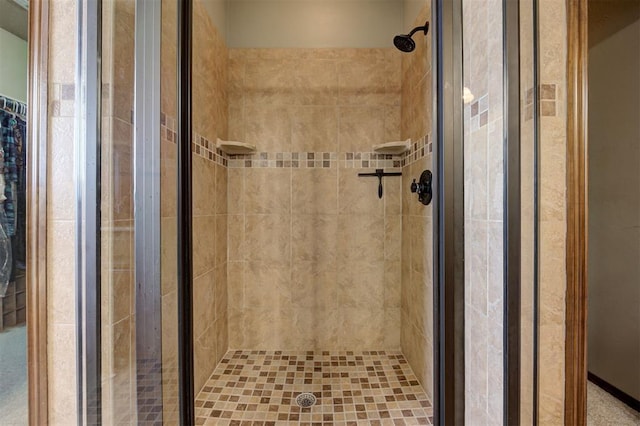 full bath with a shower stall