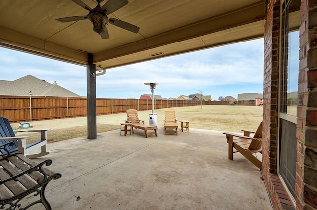 view of patio / terrace featuring a fenced backyard and ceiling fan