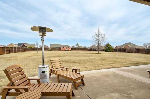 exterior space featuring a patio, a lawn, and a fenced backyard